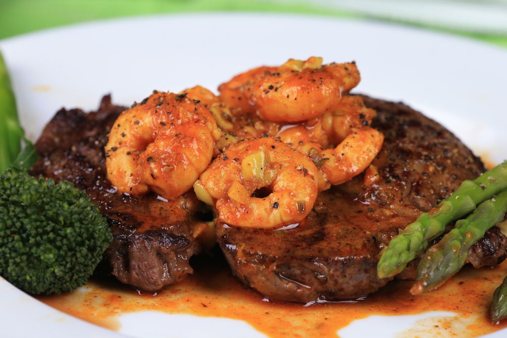 Embers Wood Grill is a high-end steakhouse in Gainesville serving a broad range of surf ‘n turf dishes. 