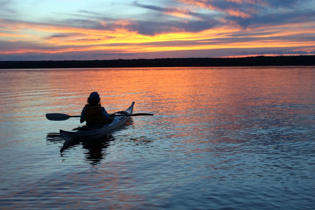 Experience a beautiful Florida sunset in the central part of the state on this kayak tour through the Chain of Lakes in Winter Park.
