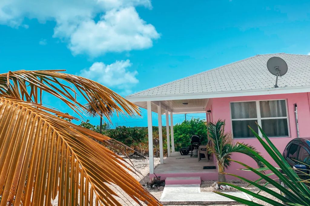 This colorful villa is a favorite in Exuma. You'll be just steps away from the white sand and pristine waters of Tropic of Cancer Beach.