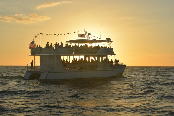 Tourists on board the sunset cruise of Gulf Mexico in the water of Naples