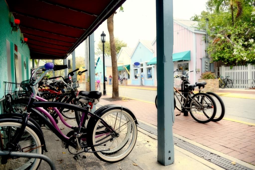 group of bicycles parked in the downtown area of Key West in Florida