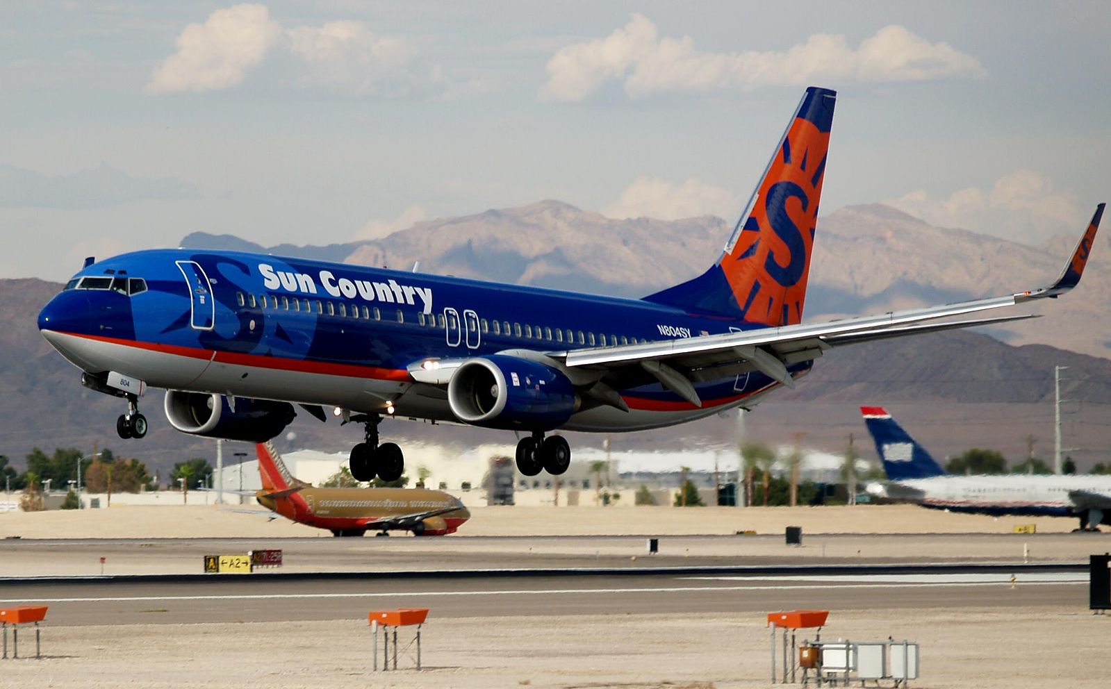 Sun Country Airline plane on the runway