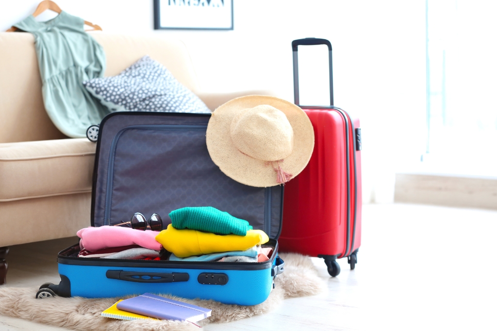 a travel suitcase with clothing and accessories for Destin vacation