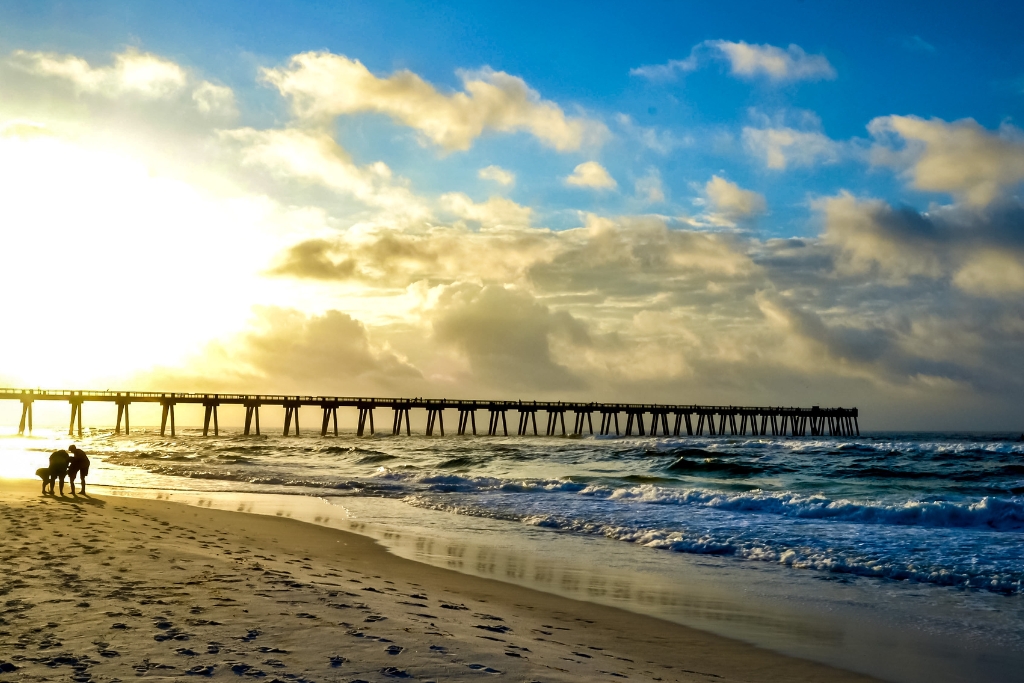 beautiful sunrise over the bridge in Navarre Beach FL