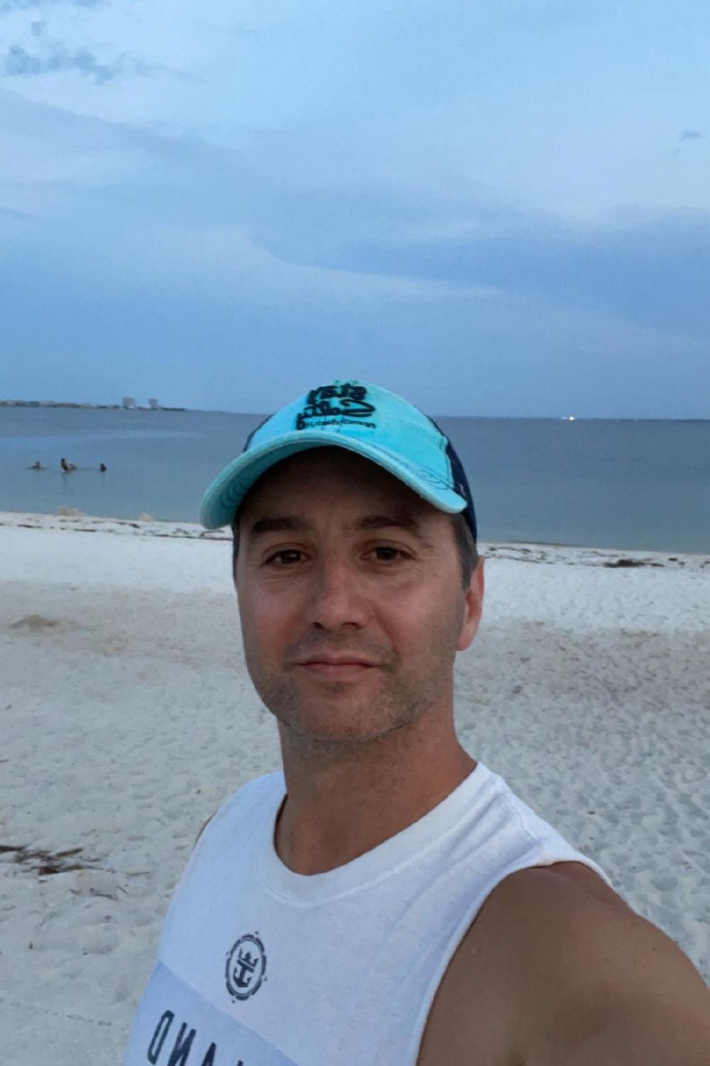 Me visiting Quietwater Beach in Pensacola Beach after sunset