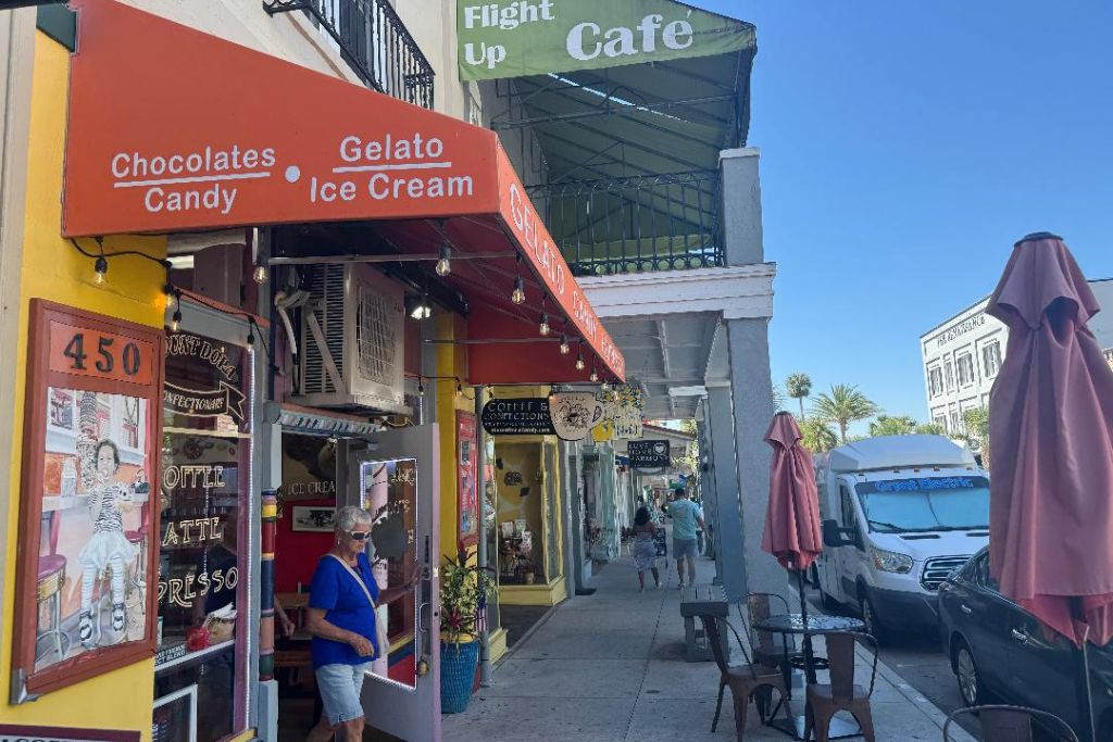 Mount Dora Mount Dora shops and a person walking out of a store