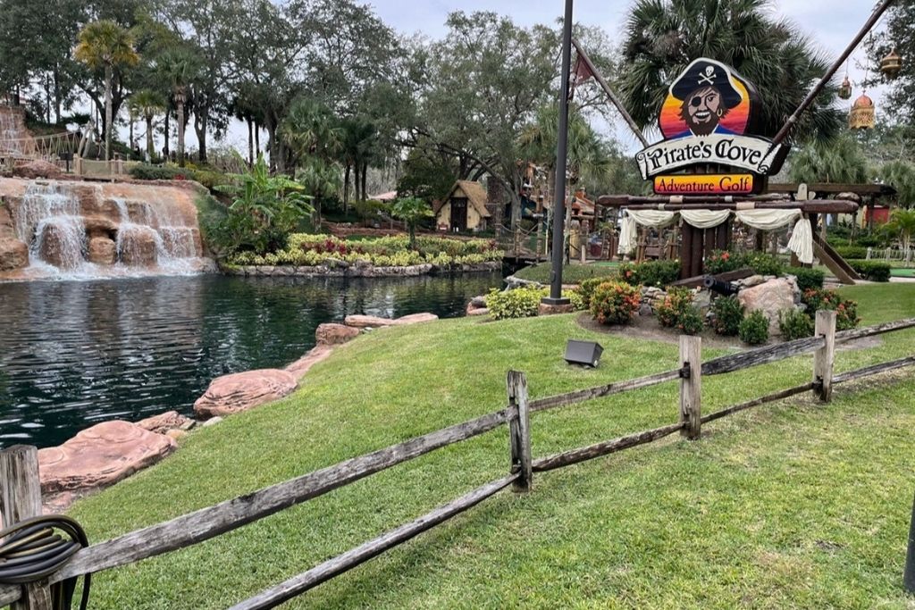 outdoor mini golf park and a pond at Pirate's Cove